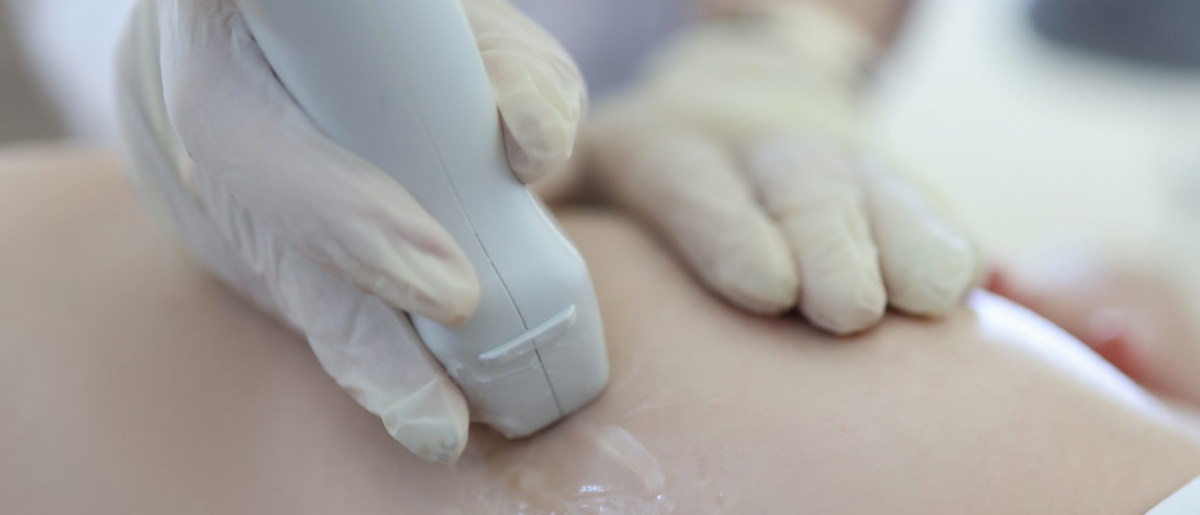 doctor-doing-ultrasound-examination-woman-breast-closeup doctor-doing-ultrasound-examination-woman-breast-closeup